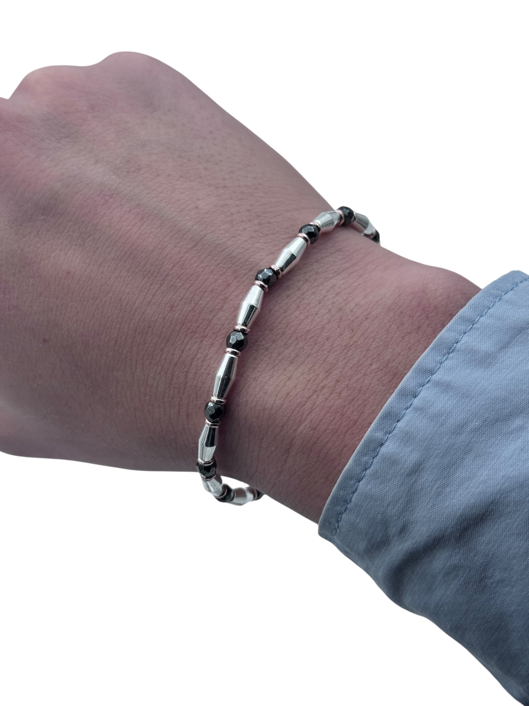 Bracciale Spadarella in argento con anelli color oro rosa e pietre nere - SPBR648