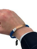 Bracciale Arkano in caucciù, colore azzurro, in acciaio 316L e placchetta centrale rivestita di oro rosa 18kt - BRIAT1 N OR
