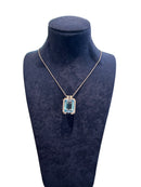 Collier en or blanc et diamants avec topaze bleue - CLD544