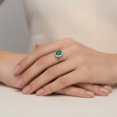 Anello Buonocore in oro bianco 18 kt e contorno di diamanti bianchi con smeraldo ovale, 0.28ct di smeraldi - 1930A01MW