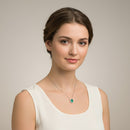 Collana Buonocore oro bianco 18kt pendente contorno diamanti bianchi con smeraldo ovale 5×4, 0.26ct di smeraldi - 1930C01MW