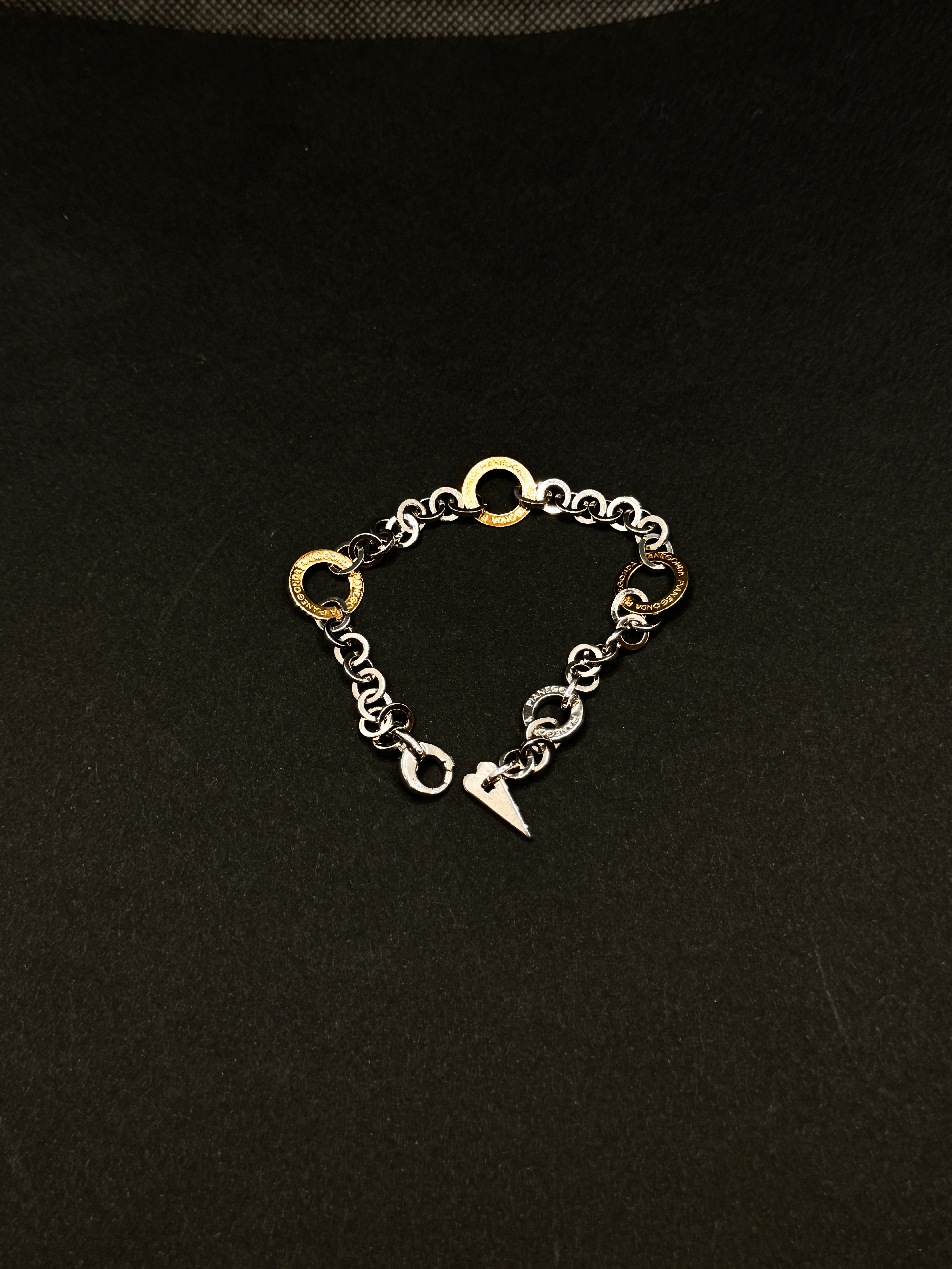 Bracciale Pianegonda in argento, con maglia a cerchietti in argento e cerchietti in oro 18kt, Collezione Gold Charm - BA050752