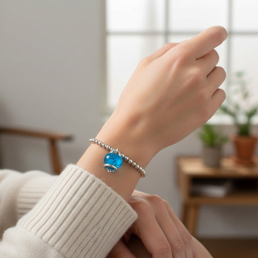 Bracciale elastico Chantecler Campanellla media, color topazio azzurro su argento su argento - 44332