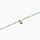 Kidult Cavigliera in acciaio dorato e inserti azzurri con conchiglia - 831278