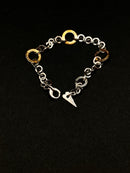 Bracciale Pianegonda in argento, con maglia a cerchietti in argento e cerchietti in oro 18kt, Collezione Gold Charm - BA050752