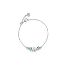 LES BONBONS BRACELET WITH CHILD SHAPE, IN WHITE GOLD WITH TOPAZES, AQUAMARINE AND DIAMOND - LBB856