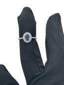 Diana - Anello in oro bianco 18kt, zaffiro centrale e giro di diamanti - AN DIANA 521+ ZA