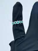 Diana - Veretta in oro bianco 18kt, giro di diamanti e 7 smeraldi - AN D. 36-7 SM