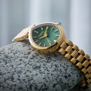 Orologio Citizen Lady, Rainell, quadrante verde scuro, PVD oro rosa, eco-drive, 35x26mm - EM1203-57X