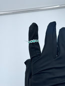 Diana - Veretta in oro bianco 18kt, giro di diamanti e 7 smeraldi - AN D. 36-7 SM