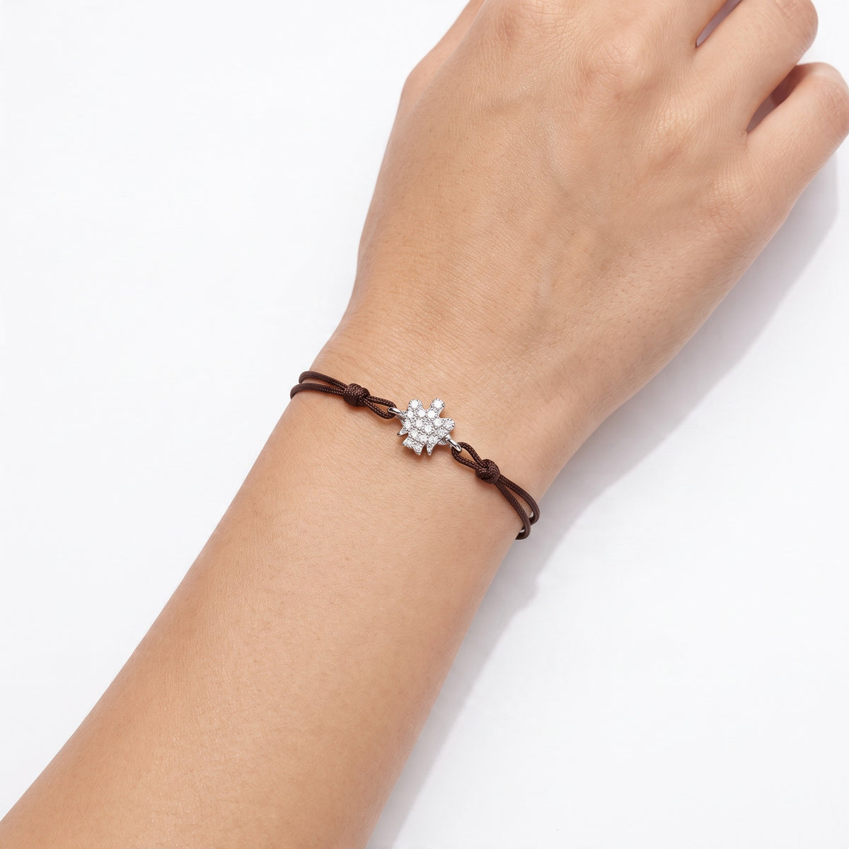 Bracciale ROBERTO GIANNOTTI con cordino nero, Angelo in argento e zirconi - GIA811