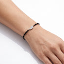 Bracciale ROBERTO GIANNOTTI con cordino nero, Ala in argento e zirconi - GIA813