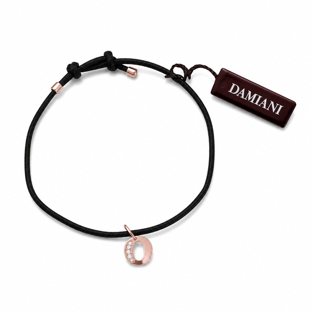 bracciale Damiani "My First" con cordino in caucciù e ciondolo lettera O in oro rosa 9kt e diamanti - DMBR0002B-O