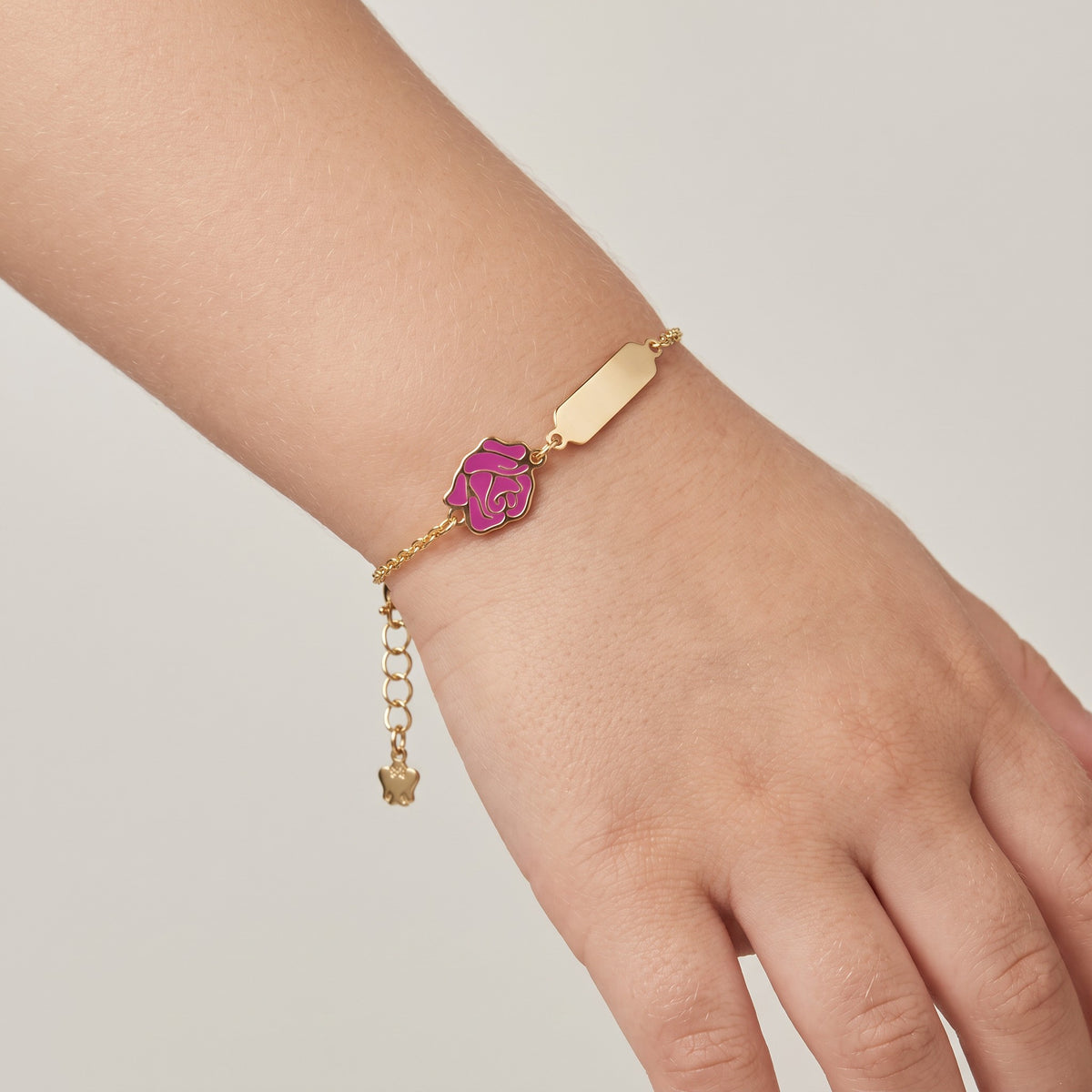 BRACCIALE ROBERTO GIANNOTTI oro 9KT bambina con targhetta e rosa - NKT484