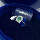 Anello Recarlo, collezione Camelia, in Oro Bianco 18kt, giro di Diamanti e Smeraldo centrale, 0.31ct di smeraldi - R77CC001/SM