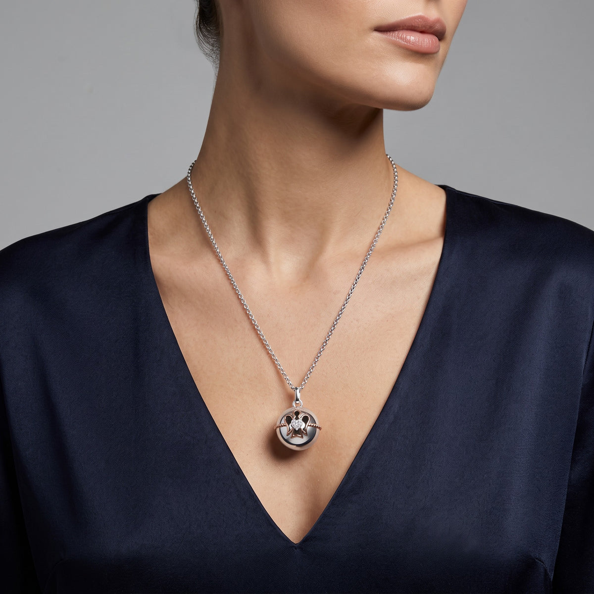 COLLANA roberto giannotti CHIAMA ANGELI in argento con angelo traforato rosato e zirconi - SFA164