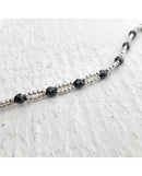 Bracelet composé d'anneaux en argent et hématite - SPBR487