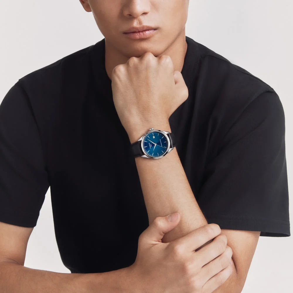 RELOJ TISSOT Classic Dream 40mm, correa de piel negra y esfera azul, movimiento AUTOMÁTICO - T1584071604100
